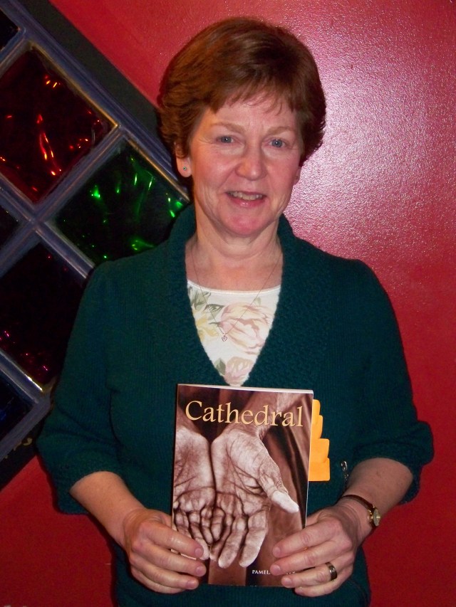 Pamela Porter holding her book