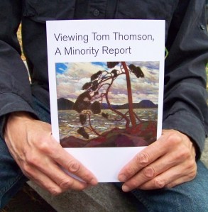 Kevin Irie holding his book