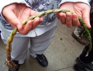Hands holding Sweetgrass