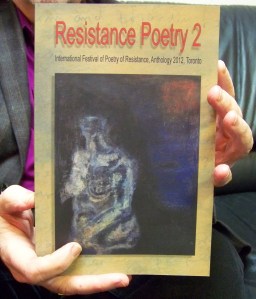 Roger Langen holding book