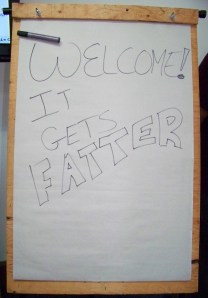 It Gets Fatter Workshop sign